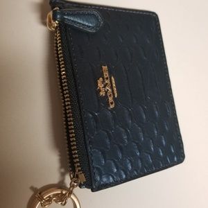 Key chain and currency holder